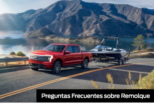 F-150 Lightning Towing FAQs. An F-150 Lightning twos a boat along and highway.